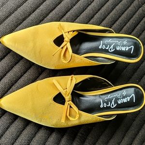 Yellow satin kitten heel